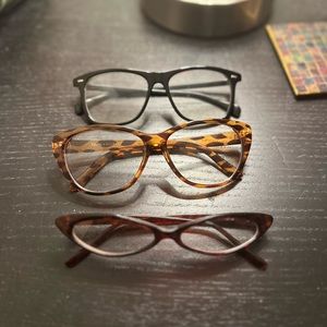Three pairs of gently worn non prescription  glasses just because.